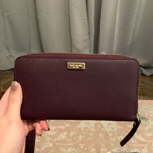 Kate spade large continental wallet. Wine Purple color